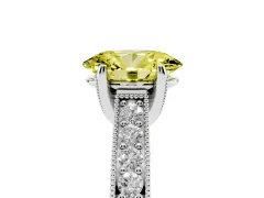 Fancy Yellow Oval Cut Diamond Solitaire Ring Set in Platinum with Milgrain-Edged Pavé Band and Prong Setting
