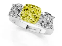 Fancy Yellow Cushion Cut Diamond Three-Stone Ring Set in White gold with Plain Polished Band