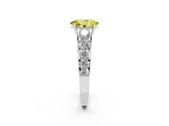 Fancy Yellow Oval Cut Diamond Solitaire Ring Set in White gold with Pavé-Set Band and Prong Setting