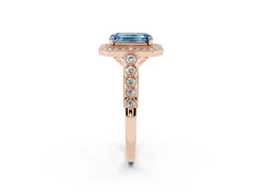 Fancy Blue Emerald Cut Diamond Milgrain Halo Solitaire Ring Set in Rose gold with Bezel Set Side Stones and Pavé Band
