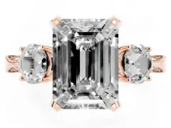 Fancy Yellow Emerald Cut Diamond Three-Stone Ring Set in Rose gold with Pavé Band and Smaller Side Stones