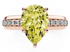 Fancy Yellow Pear Cut Diamond Solitaire Ring Set in Rose gold with Channel Set Band and Prong Setting