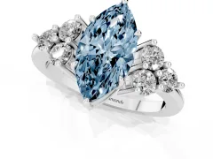 Fancy Blue Marquise Cut Diamond Solitaire Ring Set in White gold with Cluster Accents on Each Side