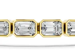 East-West Emerald Cut Diamond Tennis Bracelet Set in Yellow gold with Bezel Setting