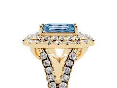 Fancy Blue Emerald Cut Diamond Double Halo Ring Set in Yellow gold with Pavé Split Shank and Prong Setting