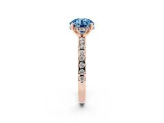 Fancy Blue Round Cut Diamond Pavé Solitaire Ring Set in Rose gold with Round Band Accents and Prong Setting
