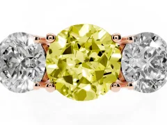 Fancy Yellow Round Cut Diamond Three-Stone Ring Set in Rose gold with Prong Setting and Plain Band