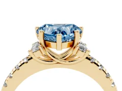 Fancy Blue Heart Cut Diamond Three-Stone Pavé Ring Set in Yellow gold with Prong Setting