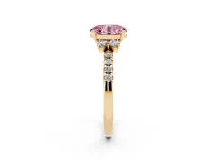 Fancy Pink Oval Cut Diamond Three-Stone Pavé Ring Set in Yellow gold with Prong Setting