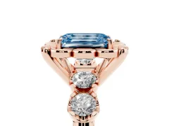 Fancy Blue Emerald Cut Diamond Floral Halo Ring Set in Rose gold with Shared Prong Band