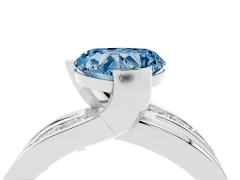 Fancy Blue Heart Cut Diamond Solitaire Ring Set in White gold with Channel Set Split Shank and Tension Prongs