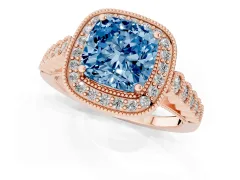 Fancy Blue Cushion Cut Diamond Milgrain Halo Solitaire Ring Set in Rose gold with Bezel Set Side Stones and Pavé Band