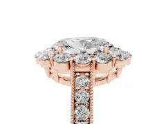 Oval Cut Diamond Halo Pavé Engagement Ring Set in Rose gold with Milgrain Detailing