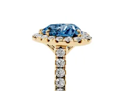 Fancy Blue Heart Cut Diamond Pavé Halo Engagement Ring Set in Yellow gold with Pavé Band and Prong Setting