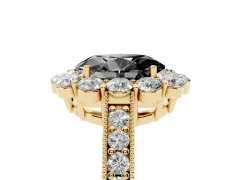 Fancy Black Oval Cut Diamond Halo Pavé Engagement Ring Set in Yellow gold with Milgrain Detailing