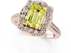 Fancy Yellow Emerald Cut Diamond Halo Ring Set in Rose gold with Pavé-Lined Shoulders and Prong Setting
