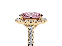 Fancy Pink Oval Cut Diamond Pavé Halo Engagement Ring Set in Yellow gold with Pavé Band and Prong Setting