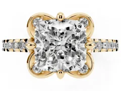 Cushion Cut Diamond Solitaire Ring Set in Yellow gold with Pavé Band and Floral Prong Setting