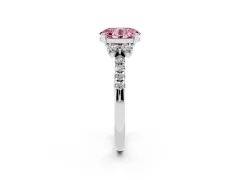 Fancy Pink Oval Cut Diamond Three-Stone Pavé Ring Set in Platinum with Prong Setting
