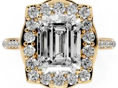 Emerald Cut Diamond Halo Ring Set in Yellow gold with Pavé-Lined Shoulders and Prong Setting