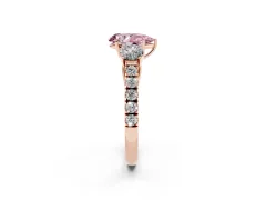 Fancy Pink Pear Cut Diamond Three-Stone Ring Set in Rose gold with Round Side Stones and Delicate Pavé Band