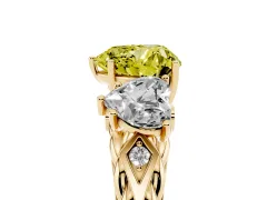 Fancy Yellow Heart Cut Diamond Three-Stone Ring Set in Yellow gold with Braided Band