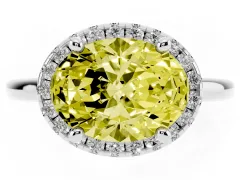 Fancy Yellow Oval Cut Diamond Halo Engagement Ring Set in Silver with Pavé Band and Rising Shoulders