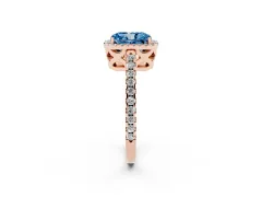 Fancy Blue Radiant Cut Diamond Halo Ring Set in Rose gold with Pavé Shoulders and Halo-Framed Center