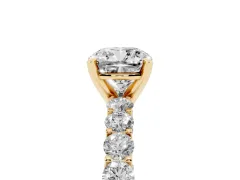 Cushion Cut Diamond Solitaire Ring Set in Yellow gold with Shared Prong Pavé Band