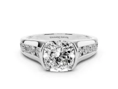 Cushion Cut Diamond Bezel-Set Solitaire Ring Set in White gold with Channel-Set Band