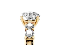 Round Cut Diamond Five-Stone Prong Set Engagement Ring Set in Yellow gold with Channel Band