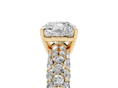 Cushion Cut Diamond Pavé Band Solitaire Ring Set in Yellow gold with Close-Set Accent Stones and Prong Setting