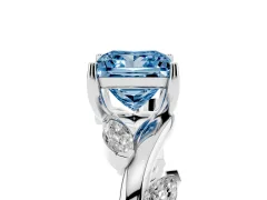 Fancy Blue Princess Cut Diamond Solitaire Ring Set in Silver with Twisted Marquise Accent Band