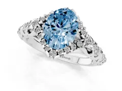 Fancy Blue Oval Cut Diamond Solitaire Ring Set in White gold with Hidden Halo and Pavé Band