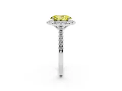 Fancy Yellow Oval Cut Diamond Pavé Halo Engagement Ring Set in Platinum with Pavé Band and Prong Setting
