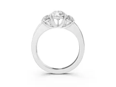 Pear Cut Diamond Three-Stone Ring Set in Platinum with Bold Center and Classic Band