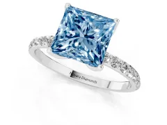 Fancy Blue Princess Cut Diamond Solitaire Engagement Ring Set in Silver with Round Pavé Band and Prong Setting