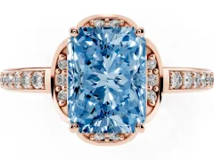 Fancy Blue Radiant Cut Diamond Halo Ring Set in Rose gold with Channel Set Band and Prong Setting
