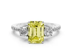 Fancy Yellow Emerald Cut Diamond Three-Stone Ring Set in Platinum with Pavé Band and Graduated Sides