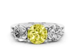 Fancy Yellow Round Cut Diamond Three-Stone Ring Set in Platinum with Prong Setting and Plain Band