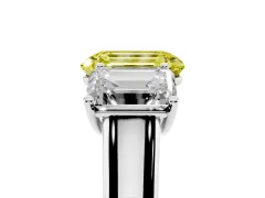 Fancy Yellow Emerald Cut Diamond Three-Stone Ring Set in Platinum with Plain Polished Band
