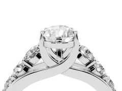 Pear Cut Diamond Pavé Engagement Ring Set in White gold with Prong Setting