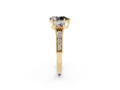 Fancy Black Pear Cut Diamond Three-Stone Ring Set in Yellow gold with Round Side Stones and Pavé Band