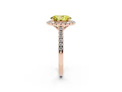 Fancy Yellow Oval Cut Diamond Pavé Halo Engagement Ring Set in Rose gold with Pavé Band and Prong Setting