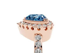 Fancy Blue Heart Cut Diamond Halo Ring Set in Rose gold with Pavé Shank and Prong Setting