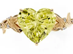 Fancy Yellow Heart Cut Diamond Solitaire Ring Set in Yellow gold with Leaf Motif Band