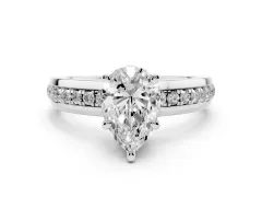 Pear Cut Diamond Solitaire Ring Set in Platinum with Channel Set Band and Prong Setting