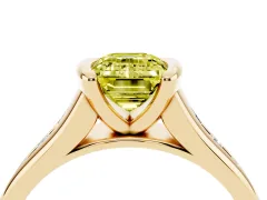 Fancy Yellow Emerald Cut Diamond Bezel-Set Solitaire Ring Set in Yellow gold with Channel-Set Band