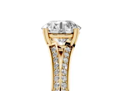 Round Cut Diamond Split Shank Pavé Engagement Ring Set in Yellow gold with Prong-Set Center Stone