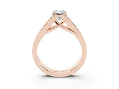 Emerald Cut Diamond Solitaire Ring Set in Rose gold with Channel-Set Accent Stones and Prong Setting